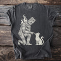 Dark gray t-shirt with a cream illustration of a wicker man kneeling to a cat.