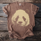 Brown t-shirt with a faded tan panda face graphic and Comfort Colors tag.