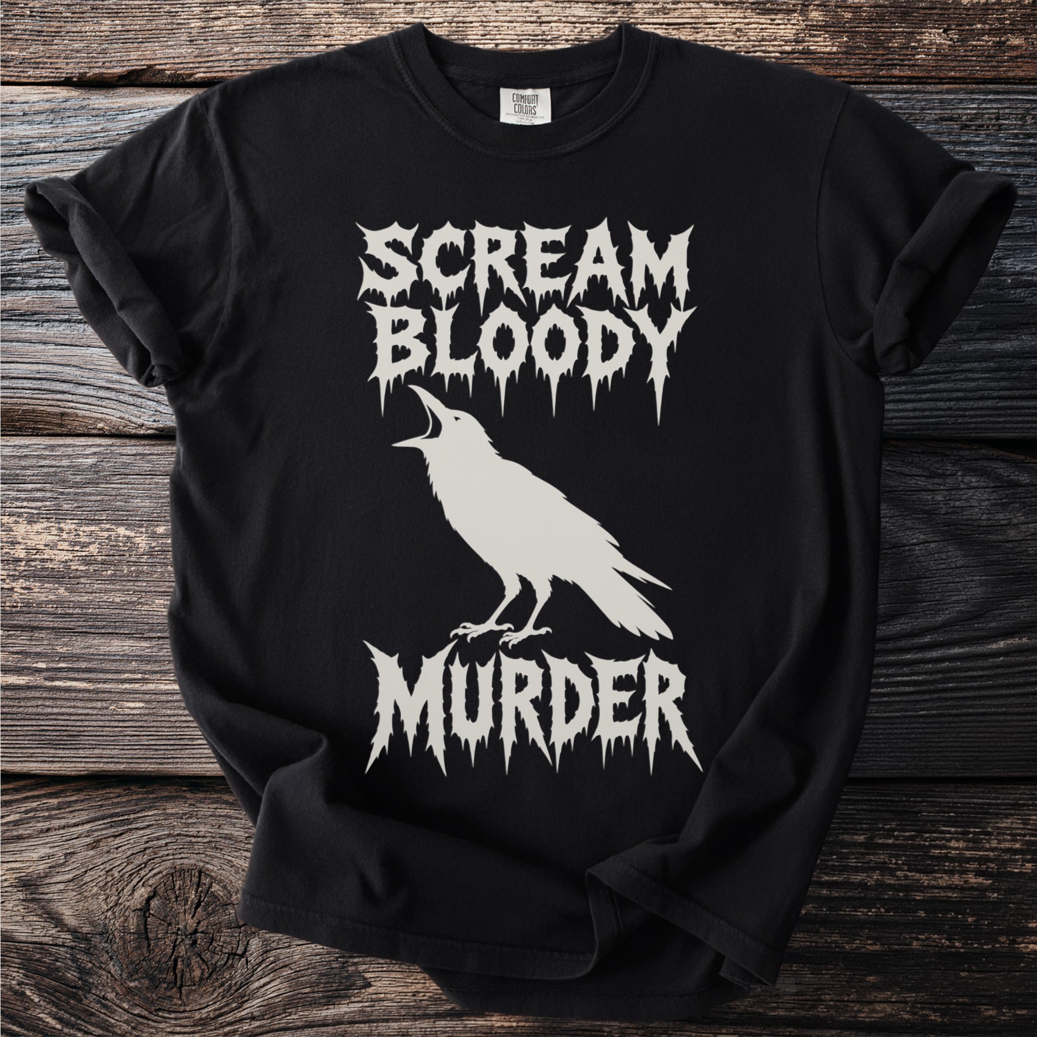 Black t-shirt with cream graphic of a crow and text "SCREAM BLOODY MURDER".