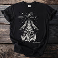 Black t-shirt with white line art of a figure adorned with foxglove and lily of the valley.
