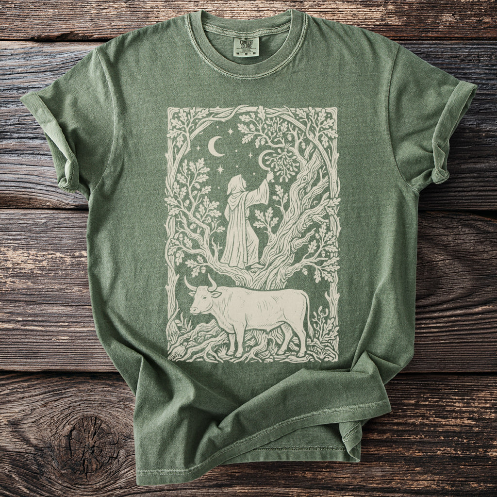 A person in a robe reaches towards the moon within a tree, with a bull below.
