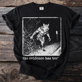 Black t-shirt with a werewolf graphic and text "the evidence has tee".