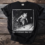Black t-shirt with a werewolf graphic and text "the evidence has tee".
