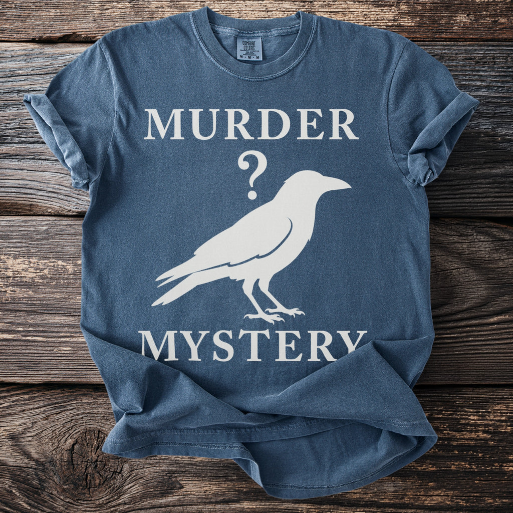 Blue t-shirt with white text "MURDER ?" and a silhouette of a crow, then "MYSTERY".