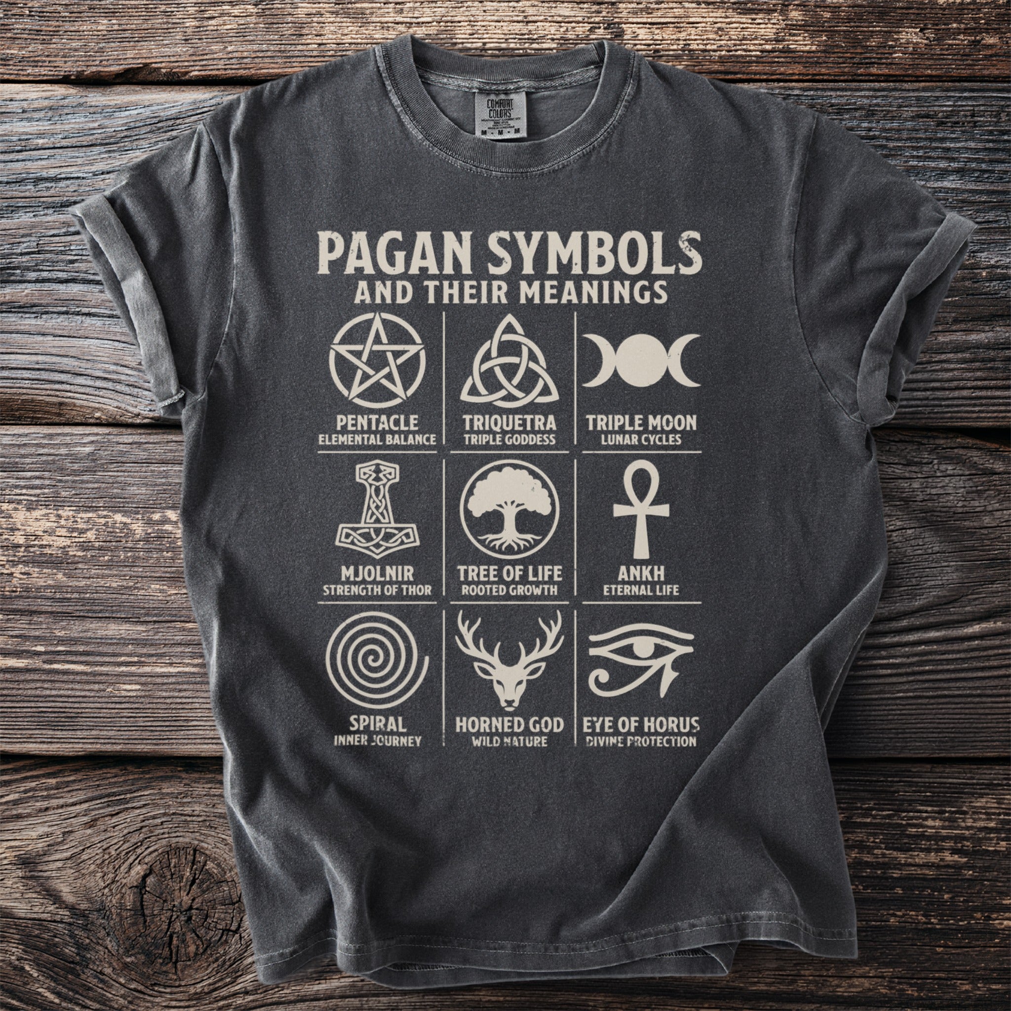 T-shirt with "Pagan Symbols and Their Meanings" title and nine illustrative symbols.