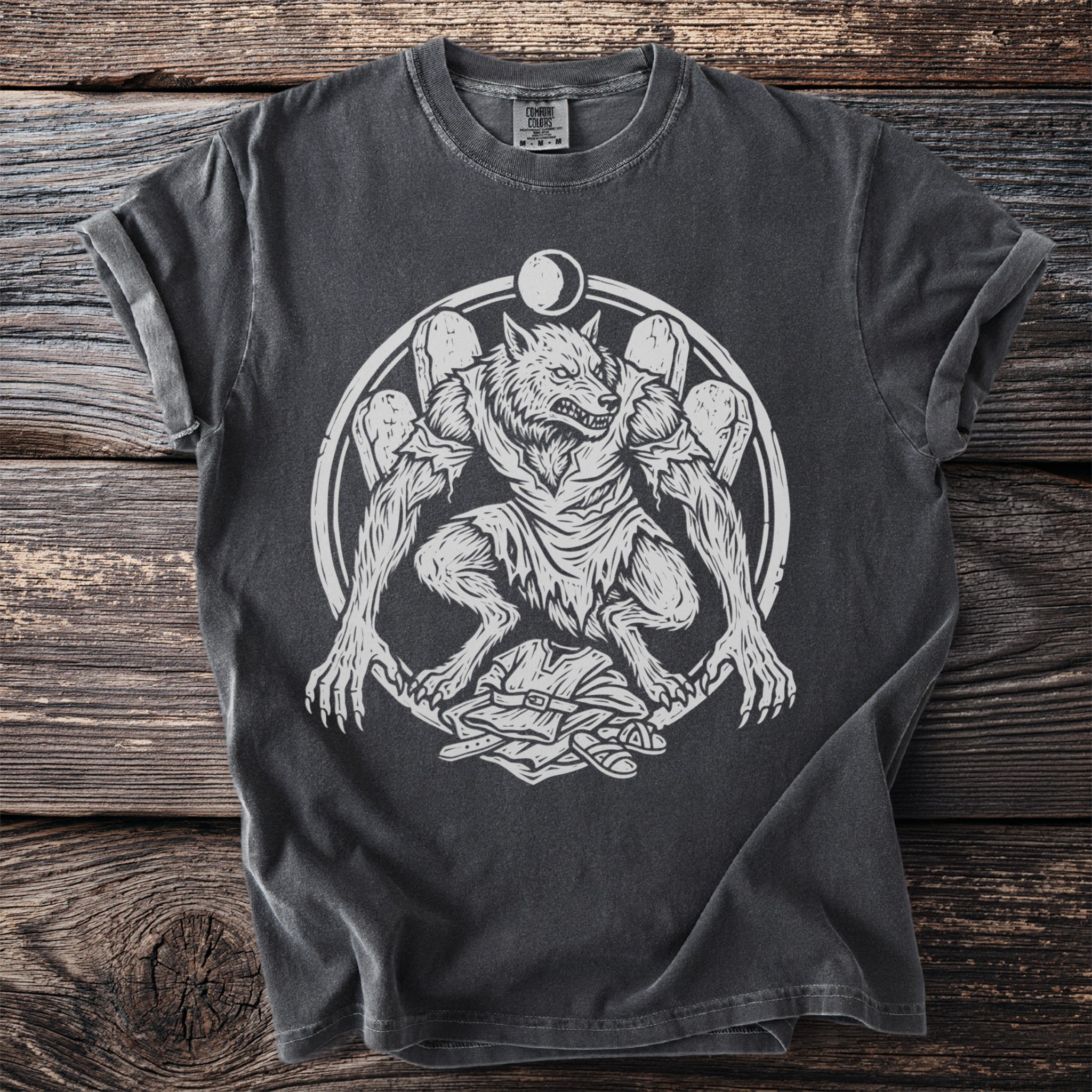 Dark grey t-shirt with white werewolf graphic, tombstones, and moon cycle.