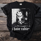 Black t-shirt with graphic of two possums and text "i have rabies".