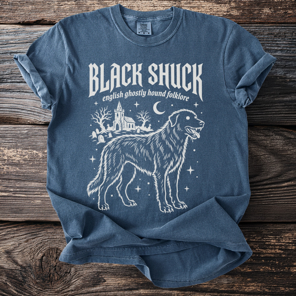 Blue t-shirt with white "Black Shuck english ghostly hound folklore" design.