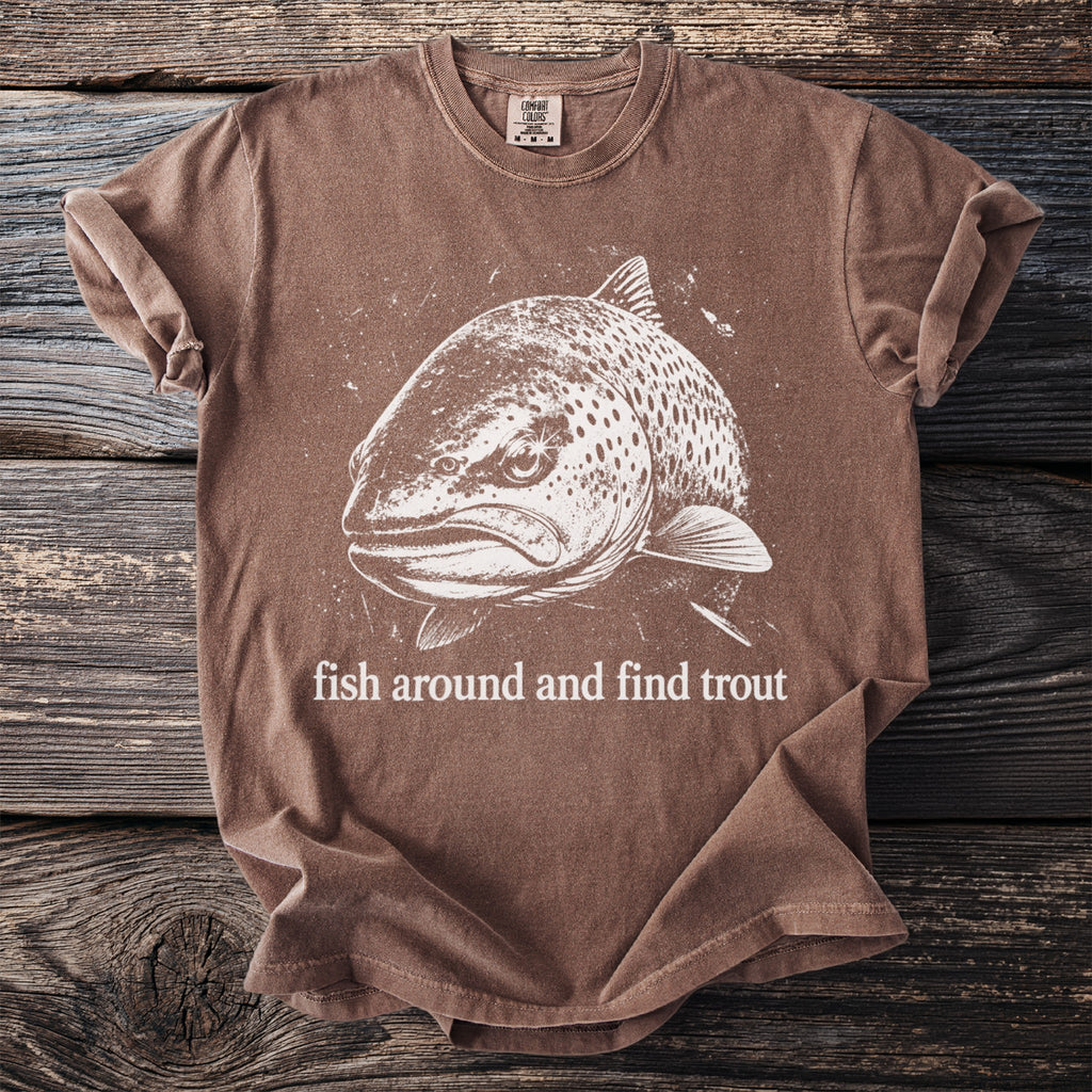 Brown t-shirt with white trout graphic and text "fish around and find trout".