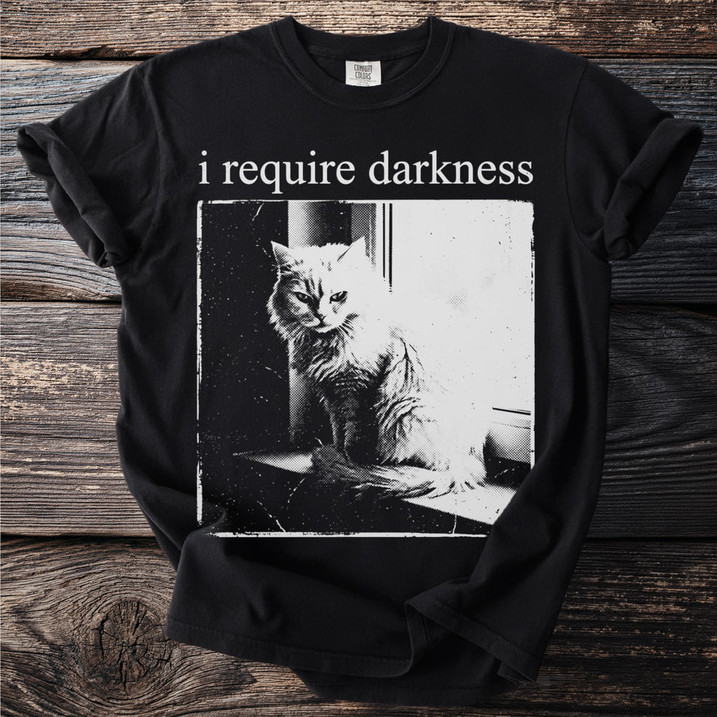 Black t-shirt with "i require darkness" and a cat illustration.