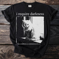 Black t-shirt with "i require darkness" and a cat illustration.