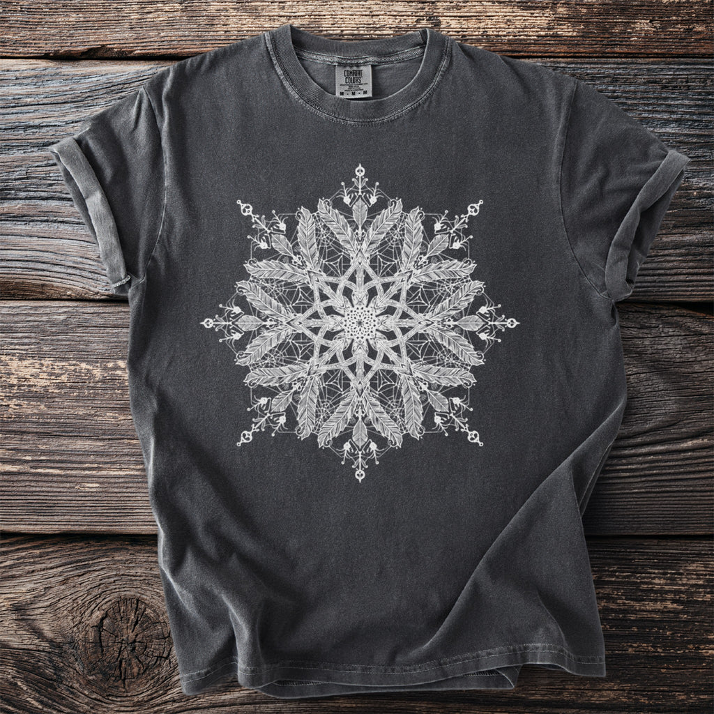 Dark grey t-shirt with a white mandala-style design featuring feathers and geometric patterns.
