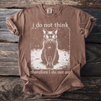Brown t-shirt with a graphic of a cat and the text "i do not think therefore i do not am".