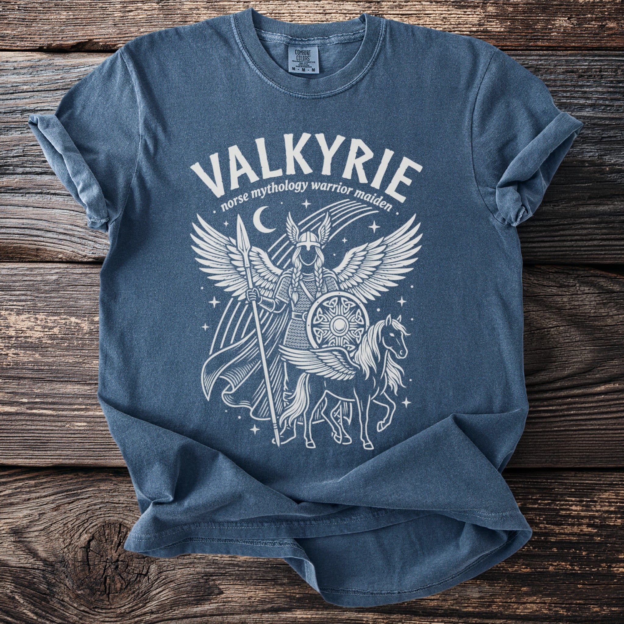Valkyrie Norse mythology warrior maiden graphic on a blue t-shirt.