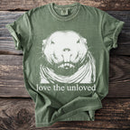 Green t-shirt with white gopher graphic and text "love the unloved".