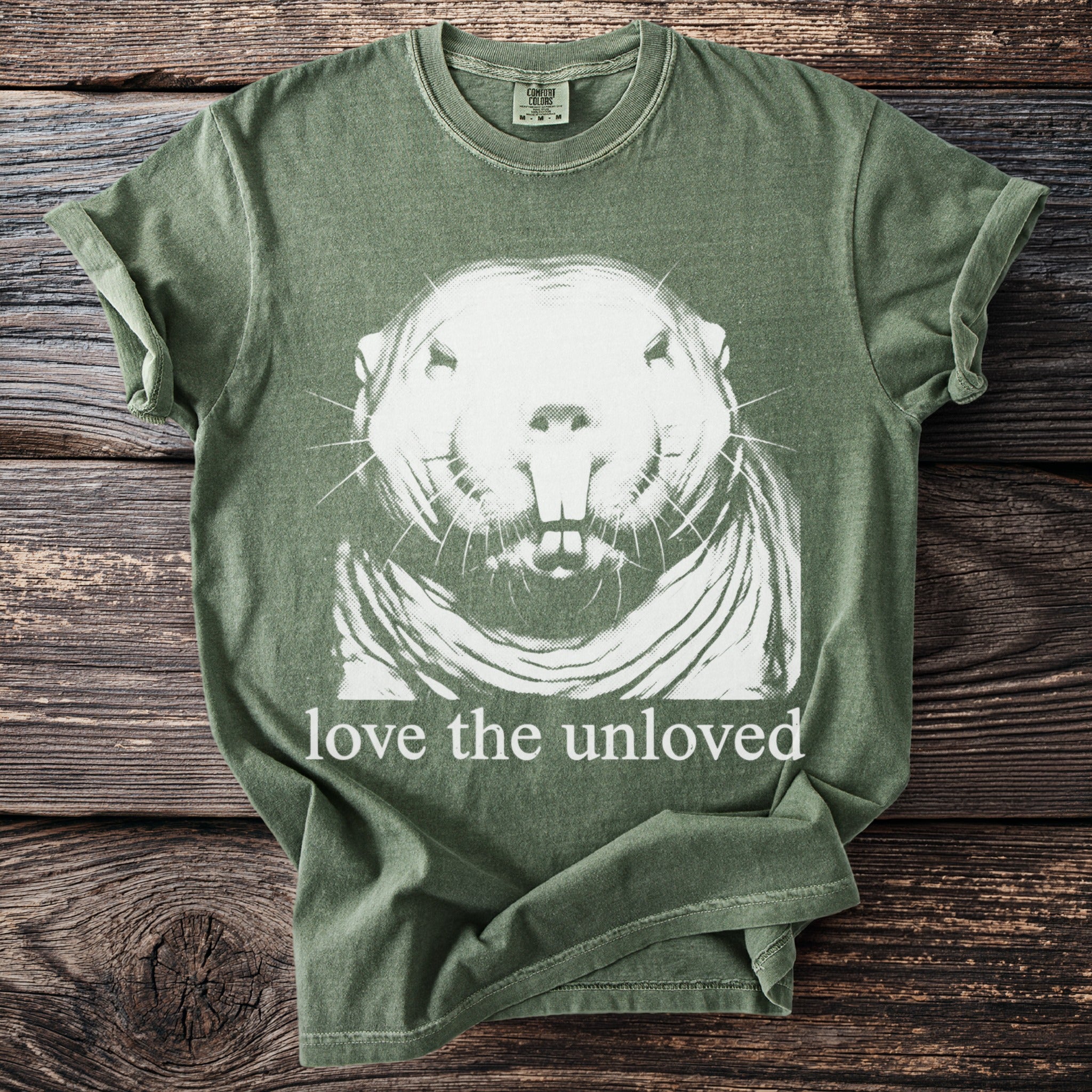 Green t-shirt with white gopher graphic and text "love the unloved".