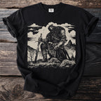Black t-shirt with a linocut-style print of a kneeling warrior holding a sword.