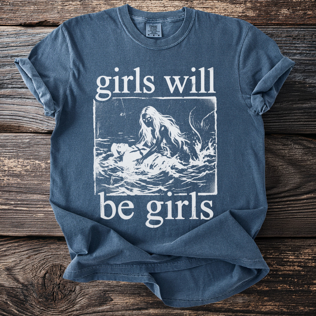 Blue t-shirt with "girls will be girls" text and a mermaid illustration.