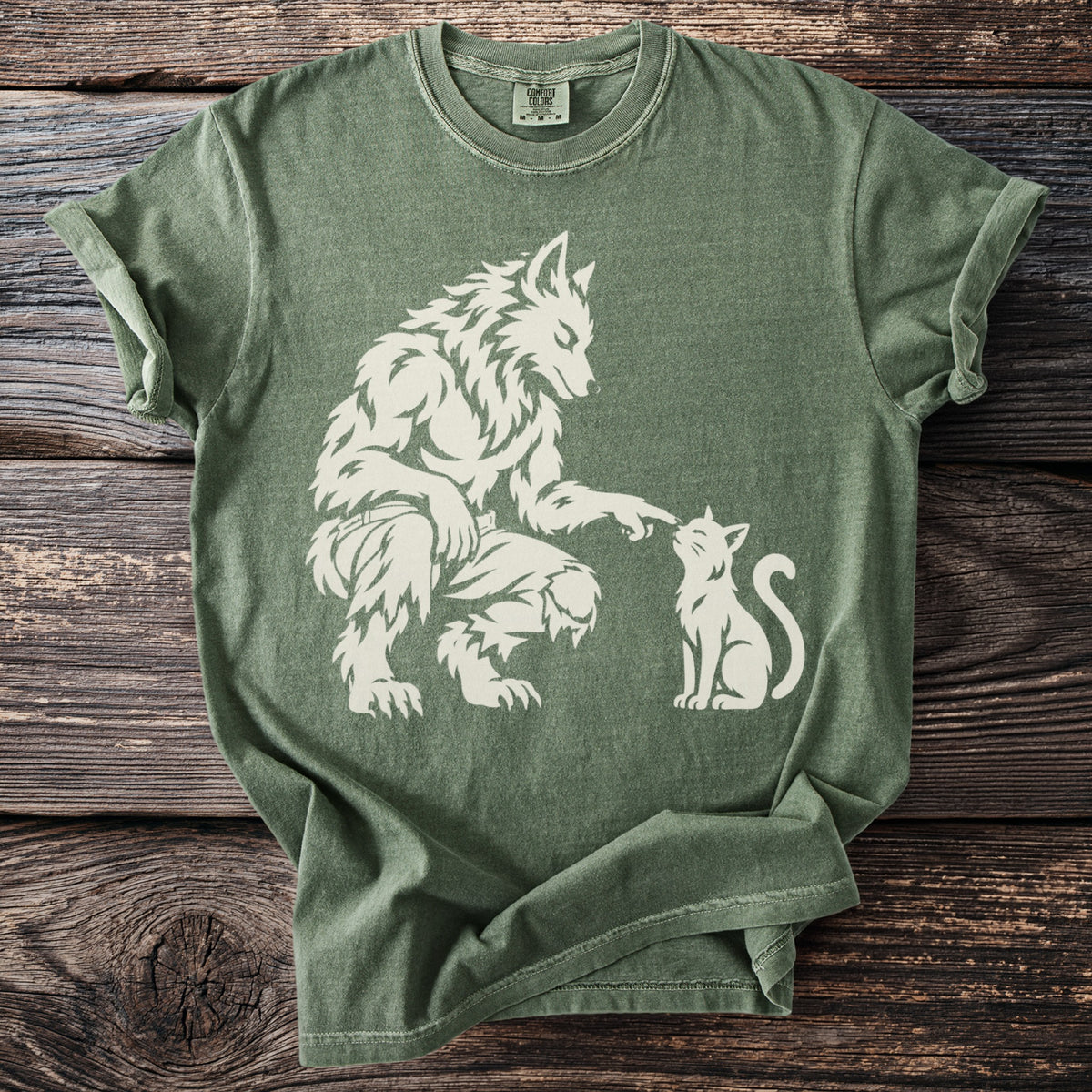 Werewolf playfully touching nose to a white cat graphic on a green t-shirt.