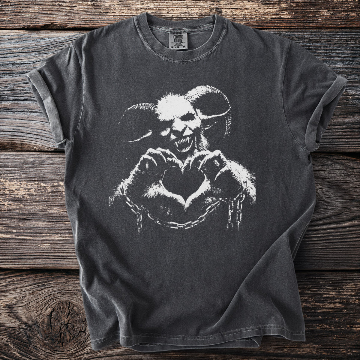 Dark grey t-shirt featuring Krampus making a heart shape with chains.