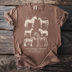 Brown t-shirt with six horse breeds illustrated on front, includes text.
