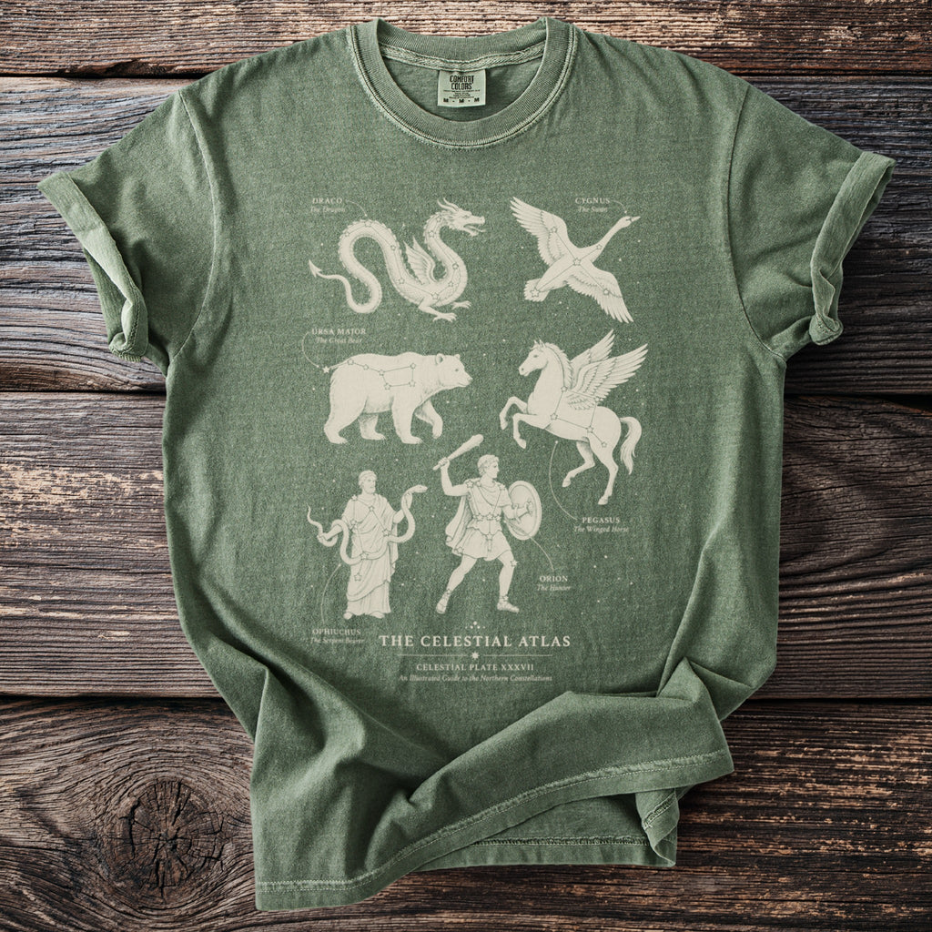 Green t-shirt with "The Celestial Atlas" design featuring five constellations.