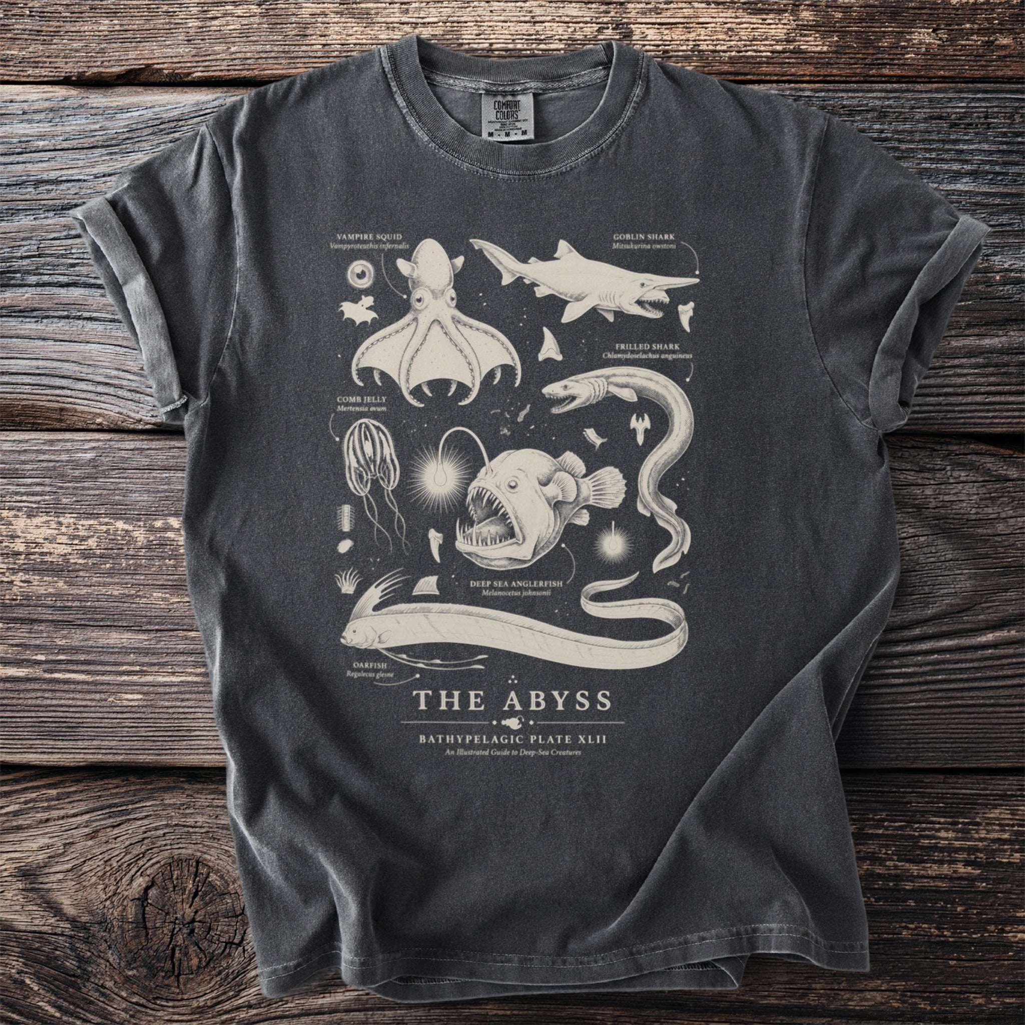 T-shirt with illustrations of deep-sea creatures and text "The Abyss" and "Bathypelagic Plate XLII".