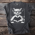 Dark gray t-shirt with a white graphic of a monster making a heart shape.