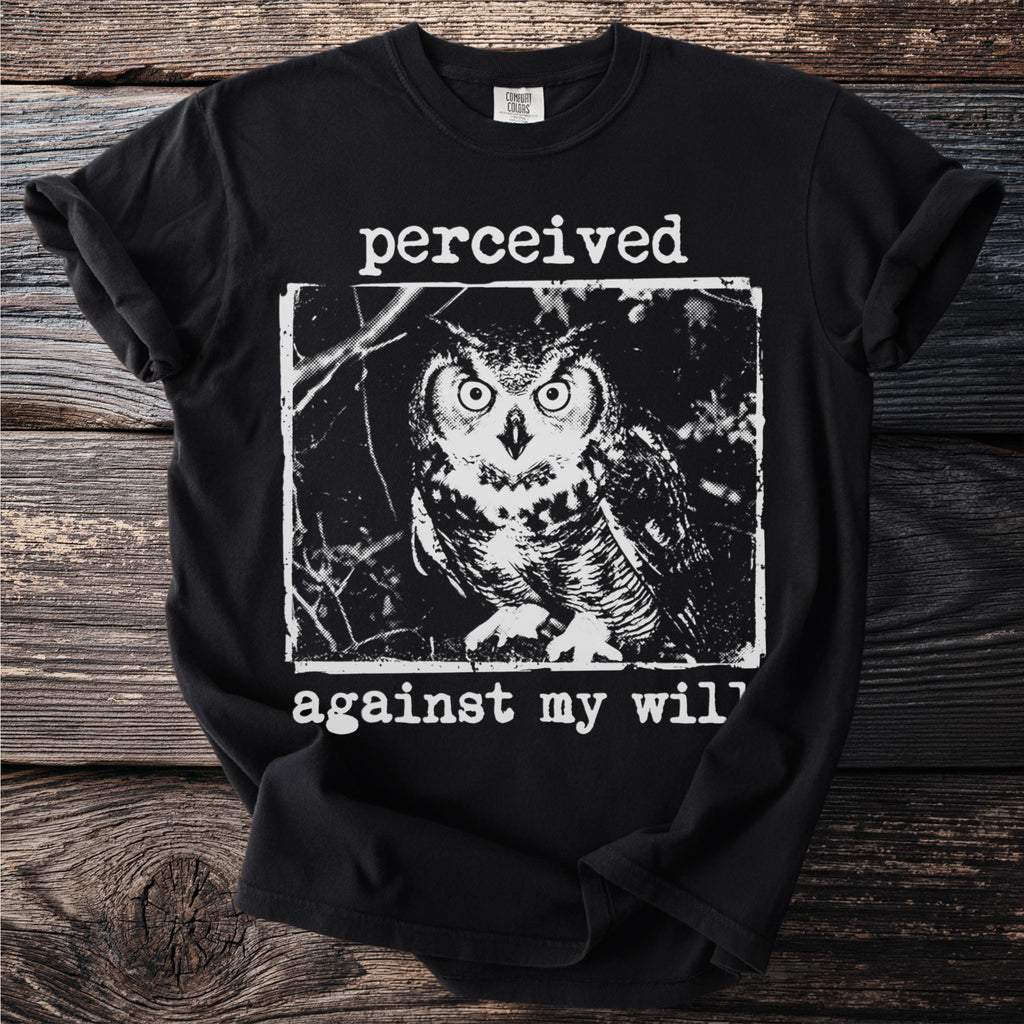 Black t-shirt with owl graphic and "perceived against my will" text.