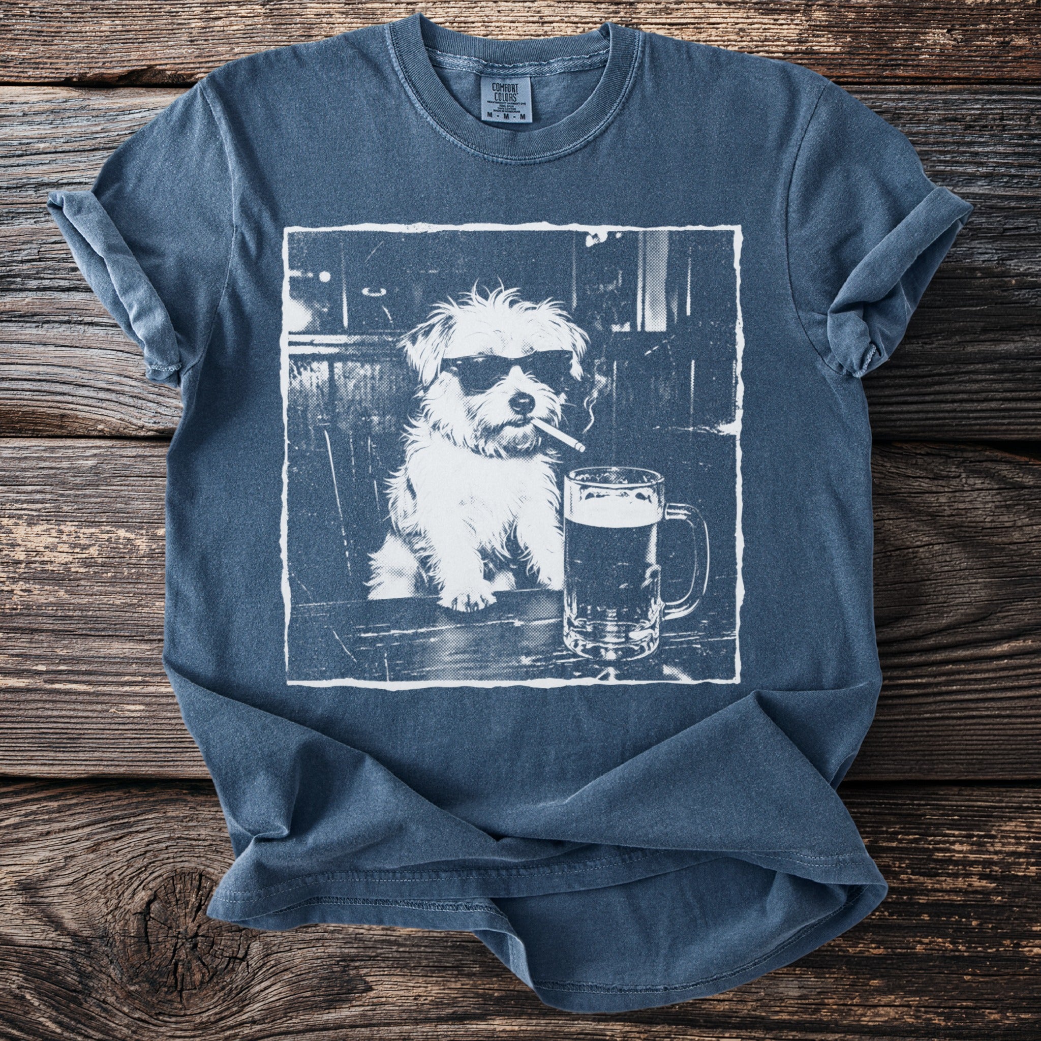 T-shirt with print of dog wearing sunglasses smoking and drinking beer.