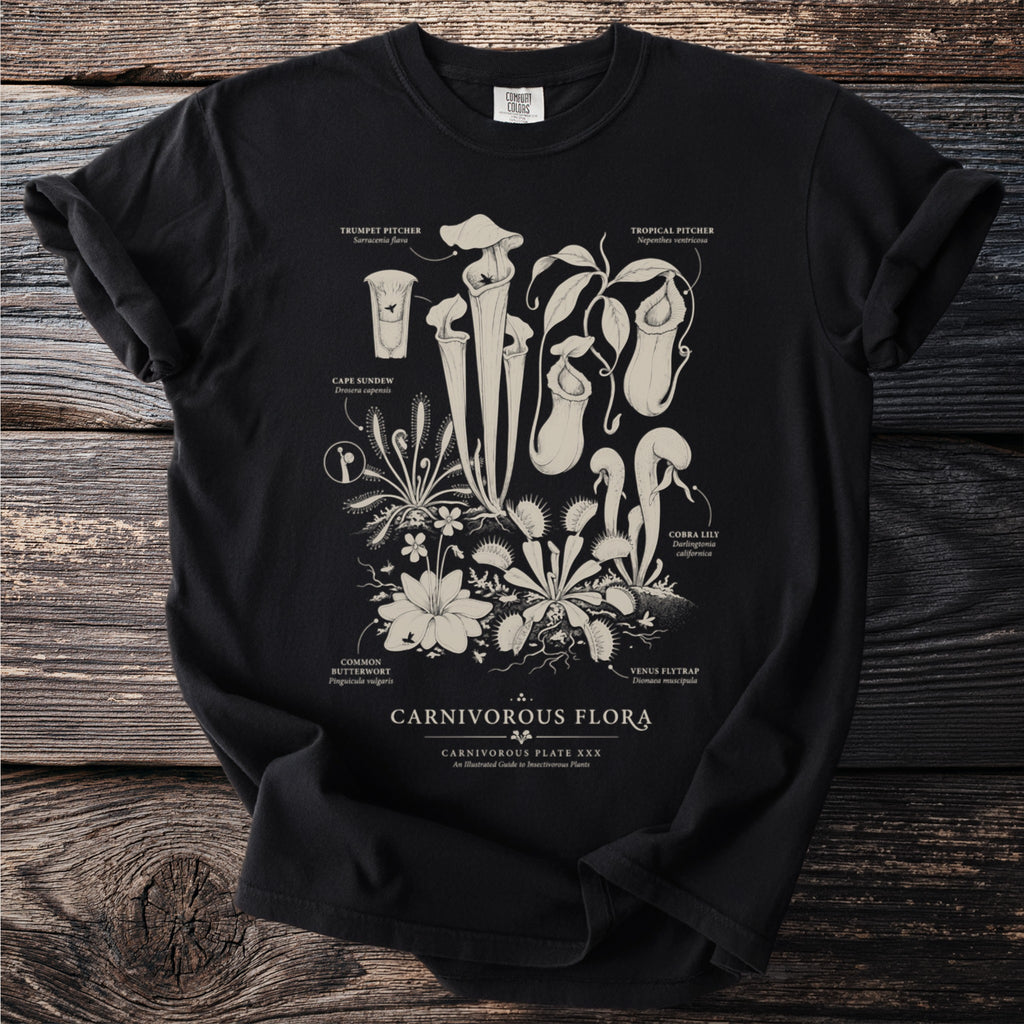 Black t-shirt with an illustrated chart of carnivorous plants labeled "Carnivorous Flora."