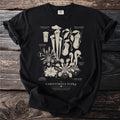 Black t-shirt with an illustrated chart of carnivorous plants labeled "Carnivorous Flora."