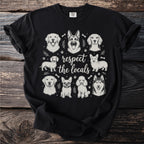 Black t-shirt with diverse dog breeds illustrated and text "respect the locals".