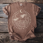 Brown t-shirt with circular design of horse, wolf, moon, stars, and runes.