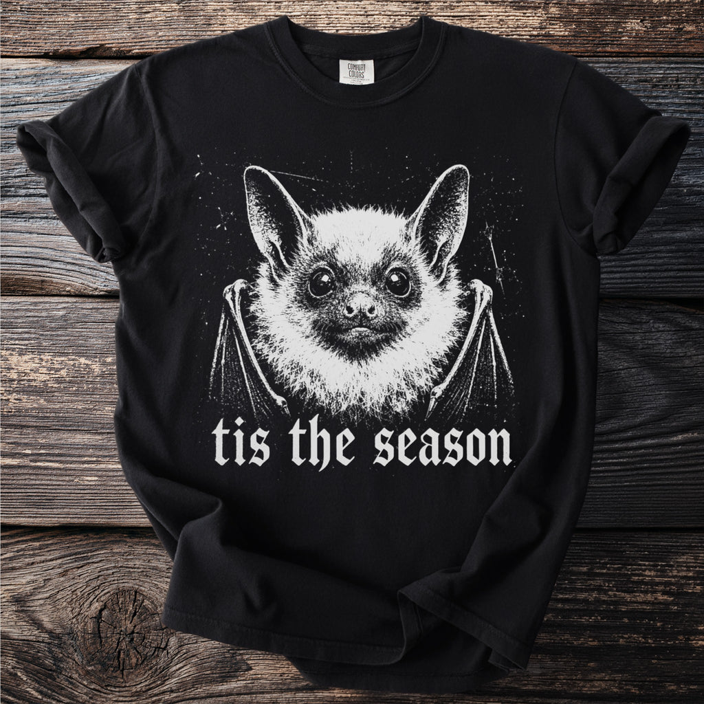 Black t-shirt with a white graphic of a bat and the text "tis the season".