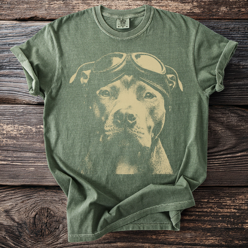 Green t-shirt with a graphic of a pit bull wearing aviator goggles.
