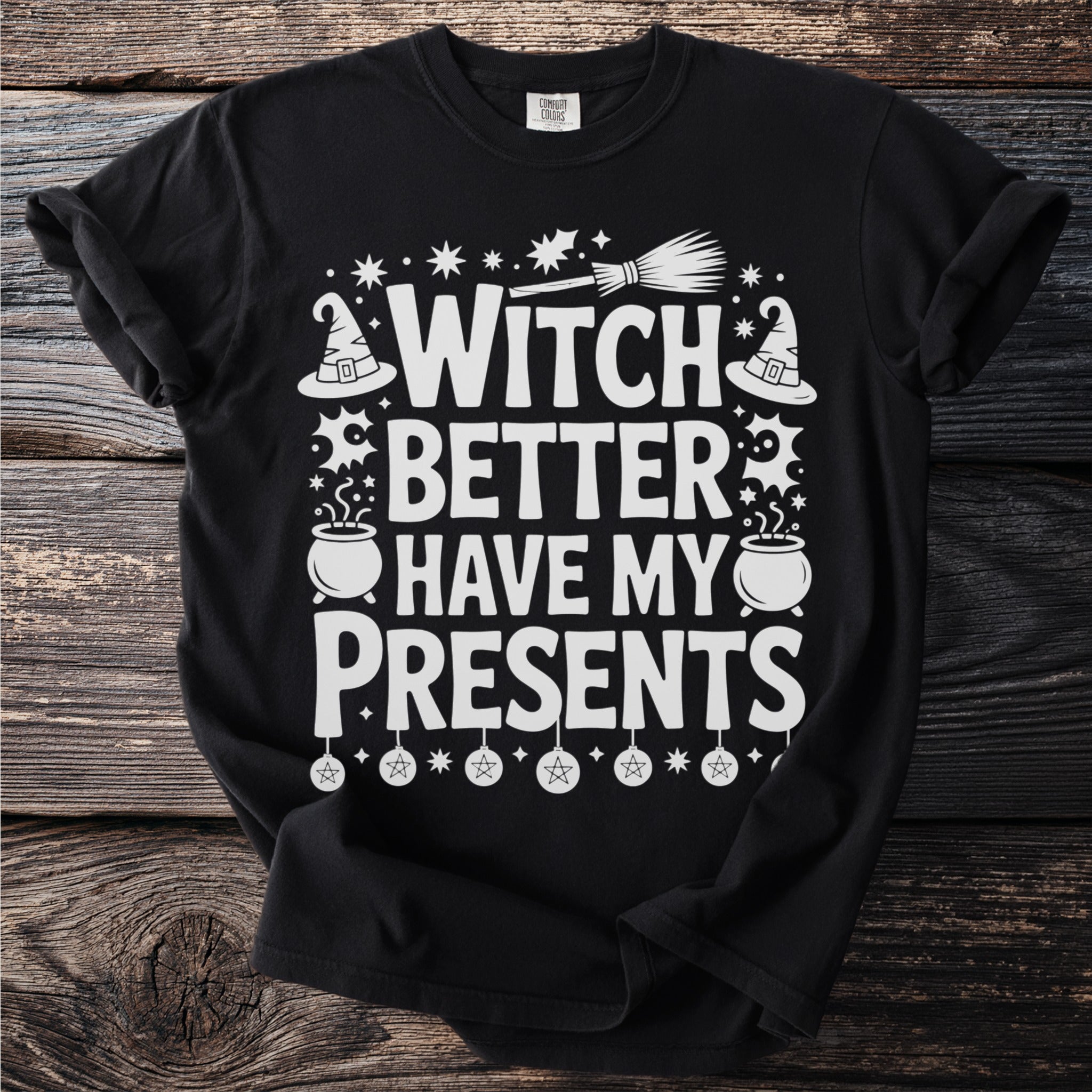 Black t-shirt with white text "WITCH BETTER HAVE MY PRESENTS" and Halloween graphics.