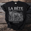 Black t-shirt with "LA BÊTE DU GÉVAUDAN" and a wolf-like creature.