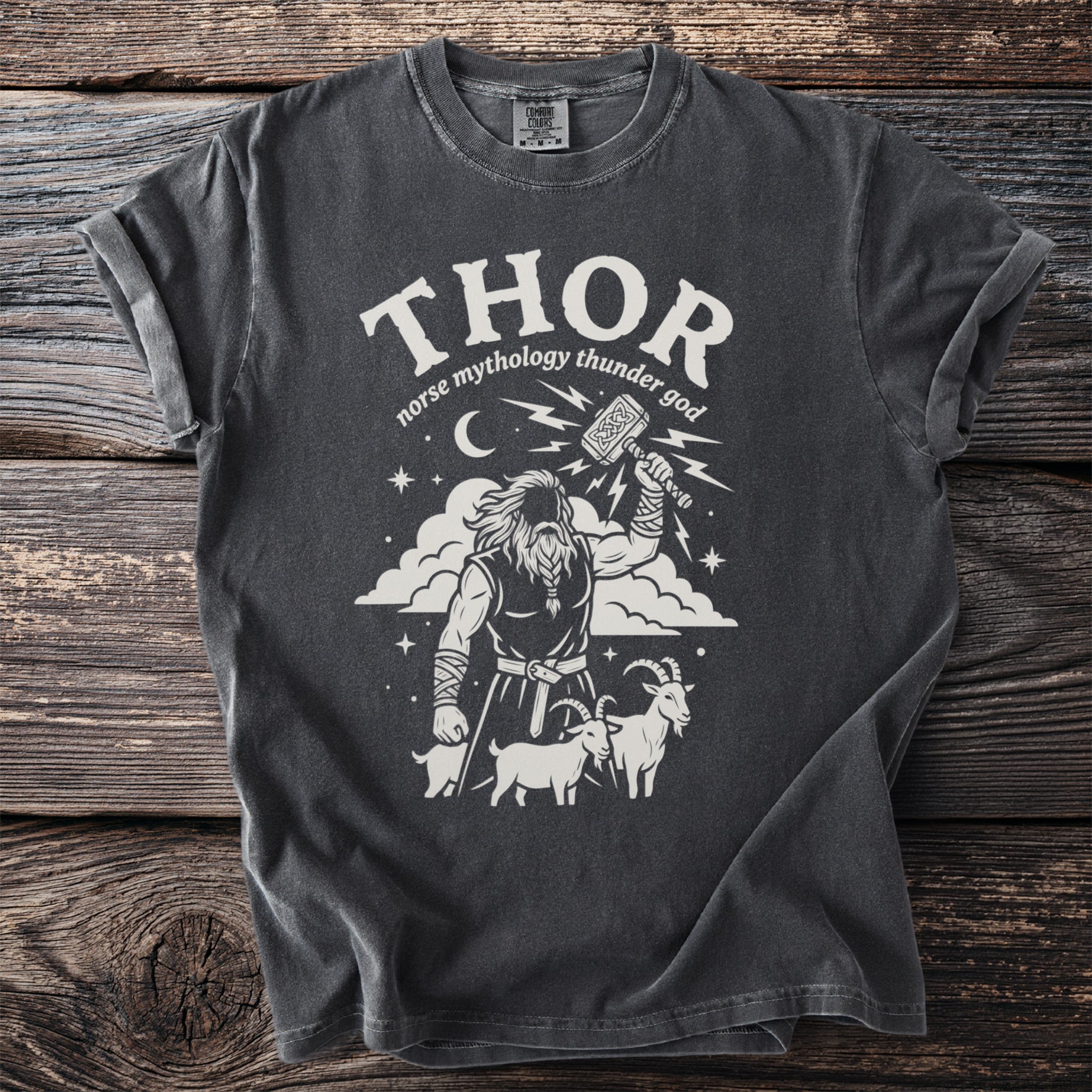 Dark grey t-shirt with Thor, Mjolnir, goats, and "thor norse mythology thunder god" text.