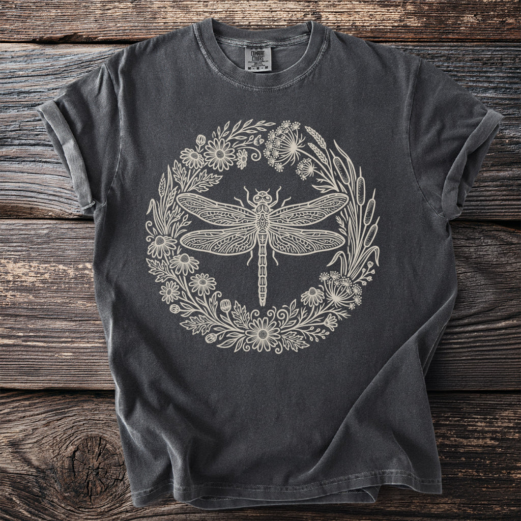 Dark gray t-shirt with a circular floral design featuring a dragonfly.