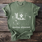 Green t-shirt with three cats at a table, text "meeting adjourned".