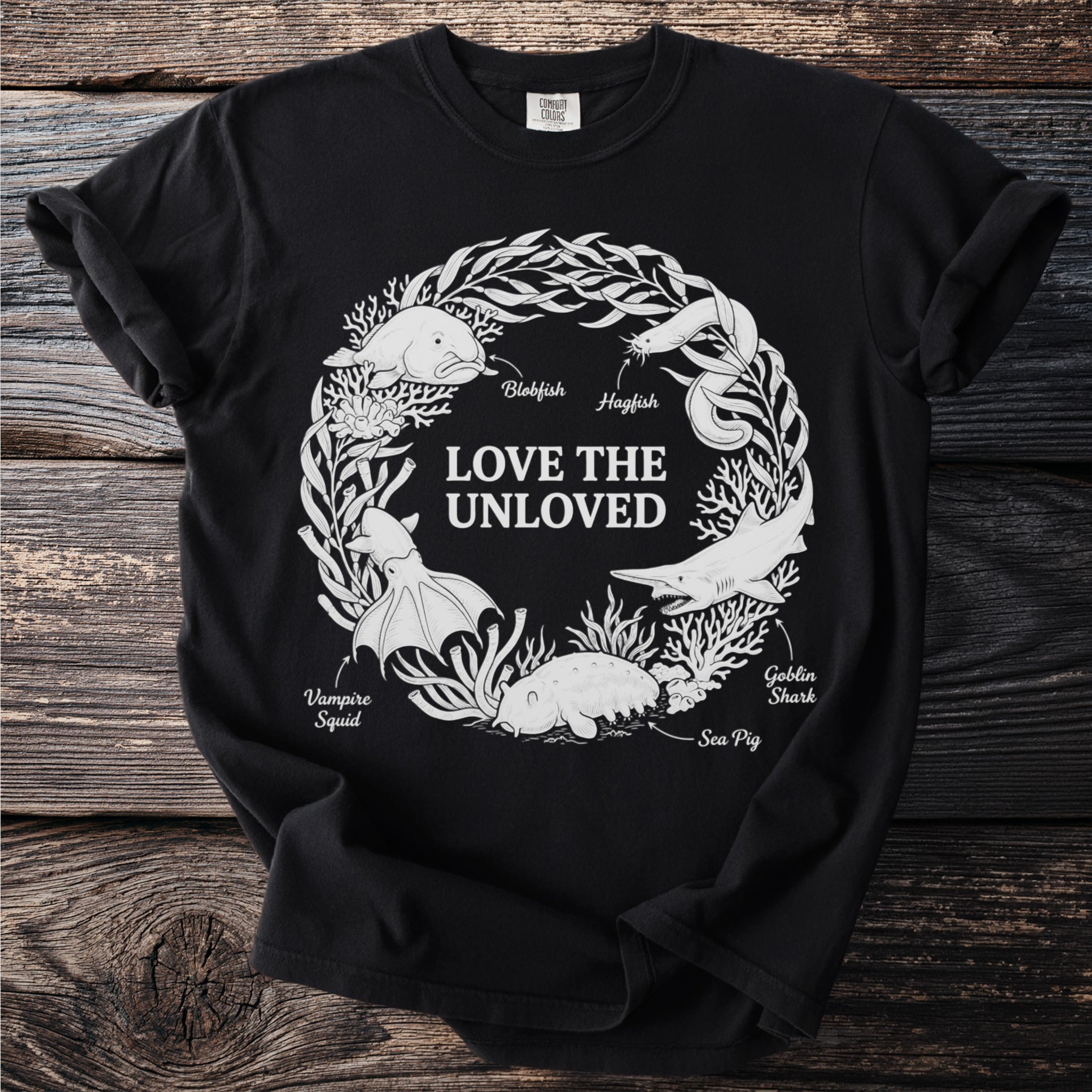 Black t-shirt with "Love the Unloved" text surrounded by illustrations of obscure sea creatures.