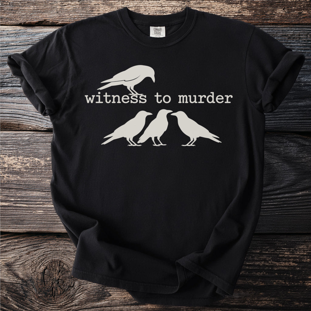 Black t-shirt with white graphic of four crows and text "witness to murder".