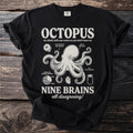 Black t-shirt with an octopus diagram and the text "OCTOPUS NINE BRAINS all disagreeing!".