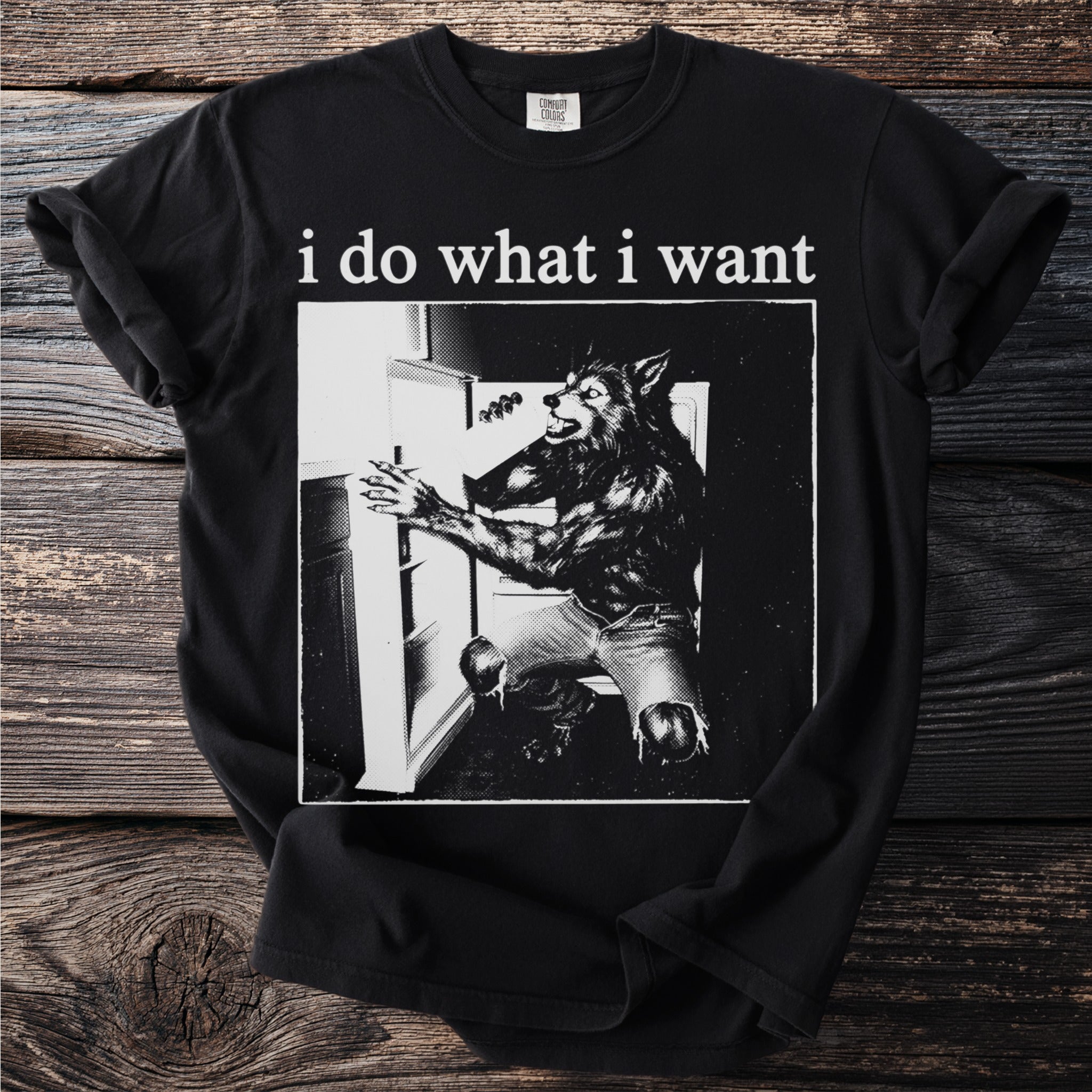Black t-shirt with "i do what i want" and werewolf illustration.