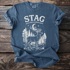 Blue t-shirt with white stag and forest graphic.