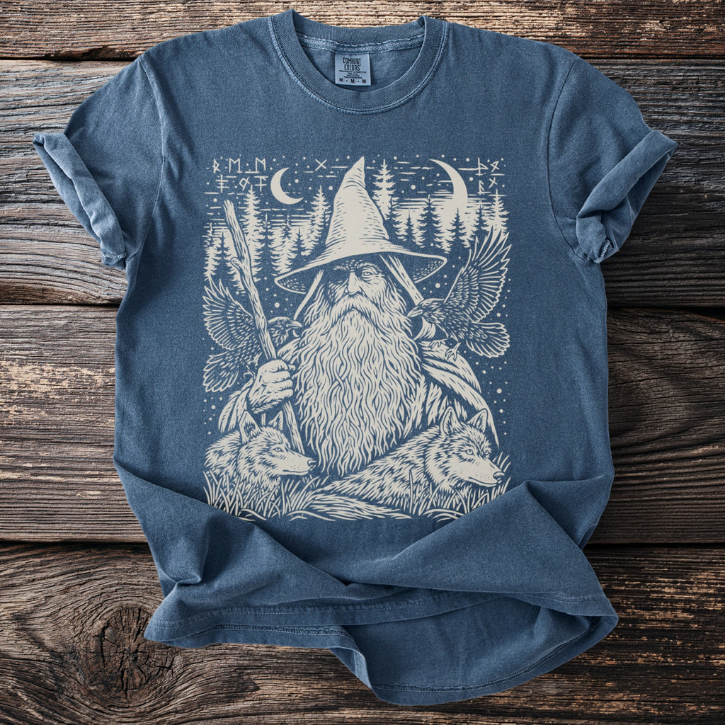 Blue t-shirt with wizard, wolves, eagles, and forest graphic design.