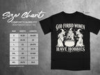 Comfort Colors 1717 size chart on black t-shirt with "God Forbid Women Have Hobbies" graphic.