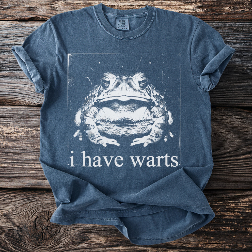Blue t-shirt with a distressed toad graphic and the text "i have warts".