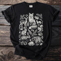 Black t-shirt with a detailed linocut-style print of woodland animals and foliage.